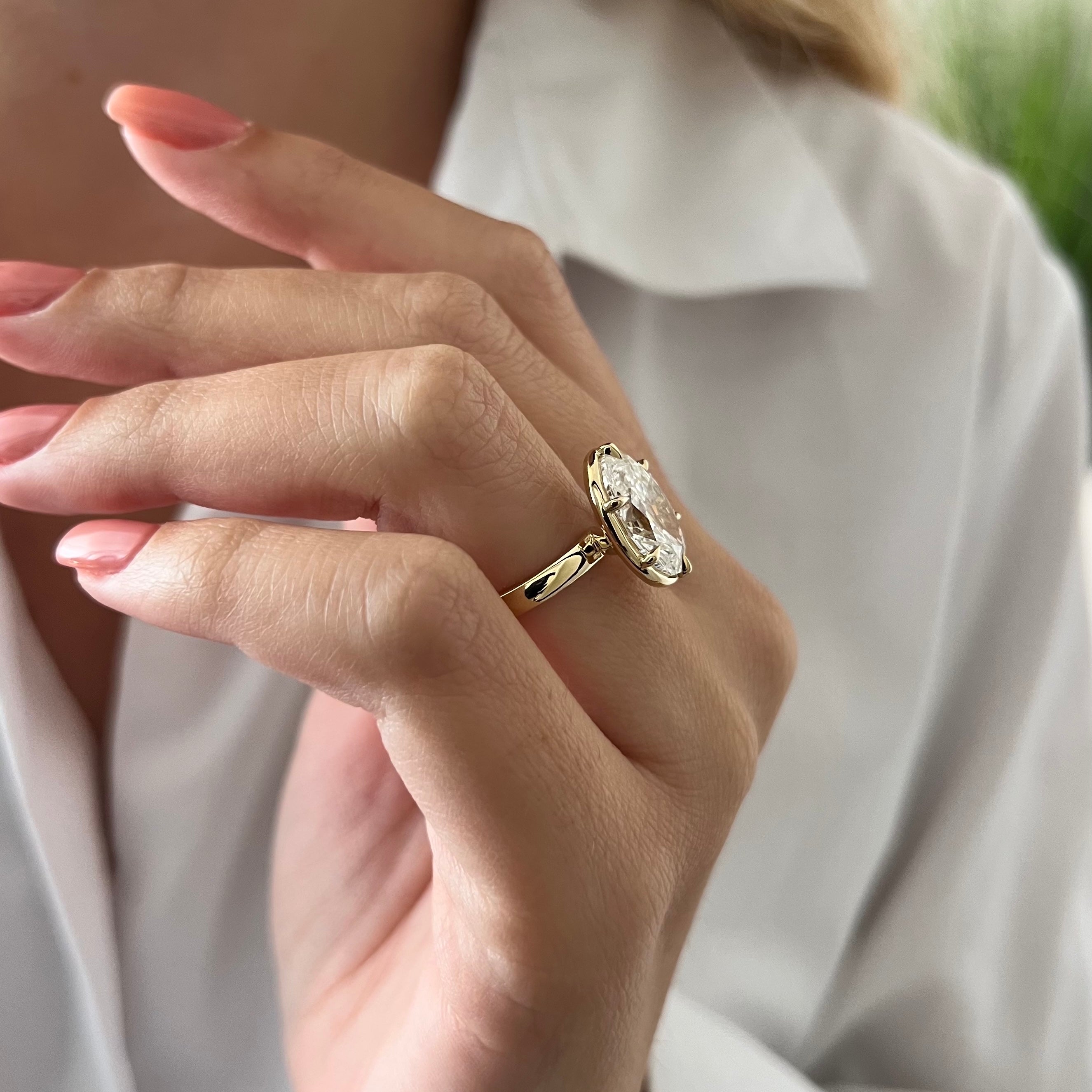 5 carat Oval cut lab-grown diamond IGI certified, bezel engagement ring.