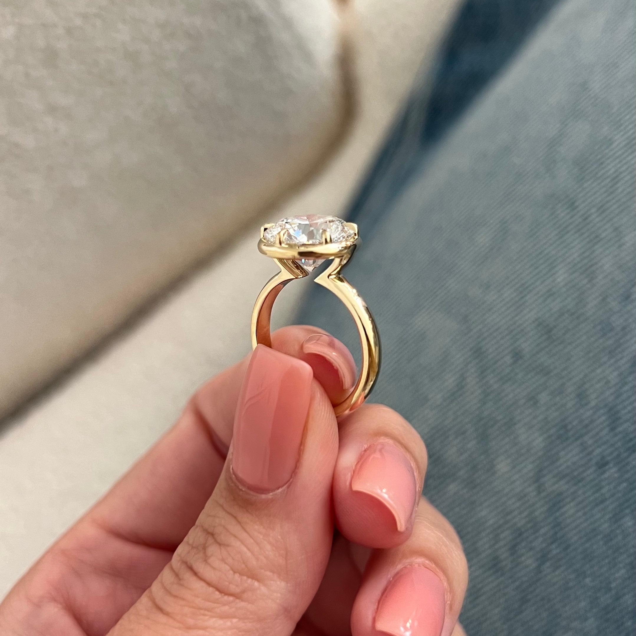 5 carat Oval cut lab-grown diamond IGI certified, bezel engagement ring.