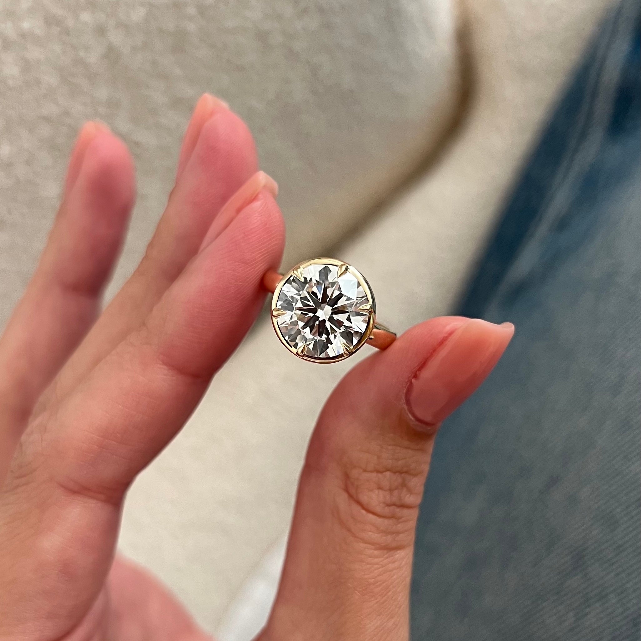 5 carat Oval cut lab-grown diamond IGI certified, bezel engagement ring.