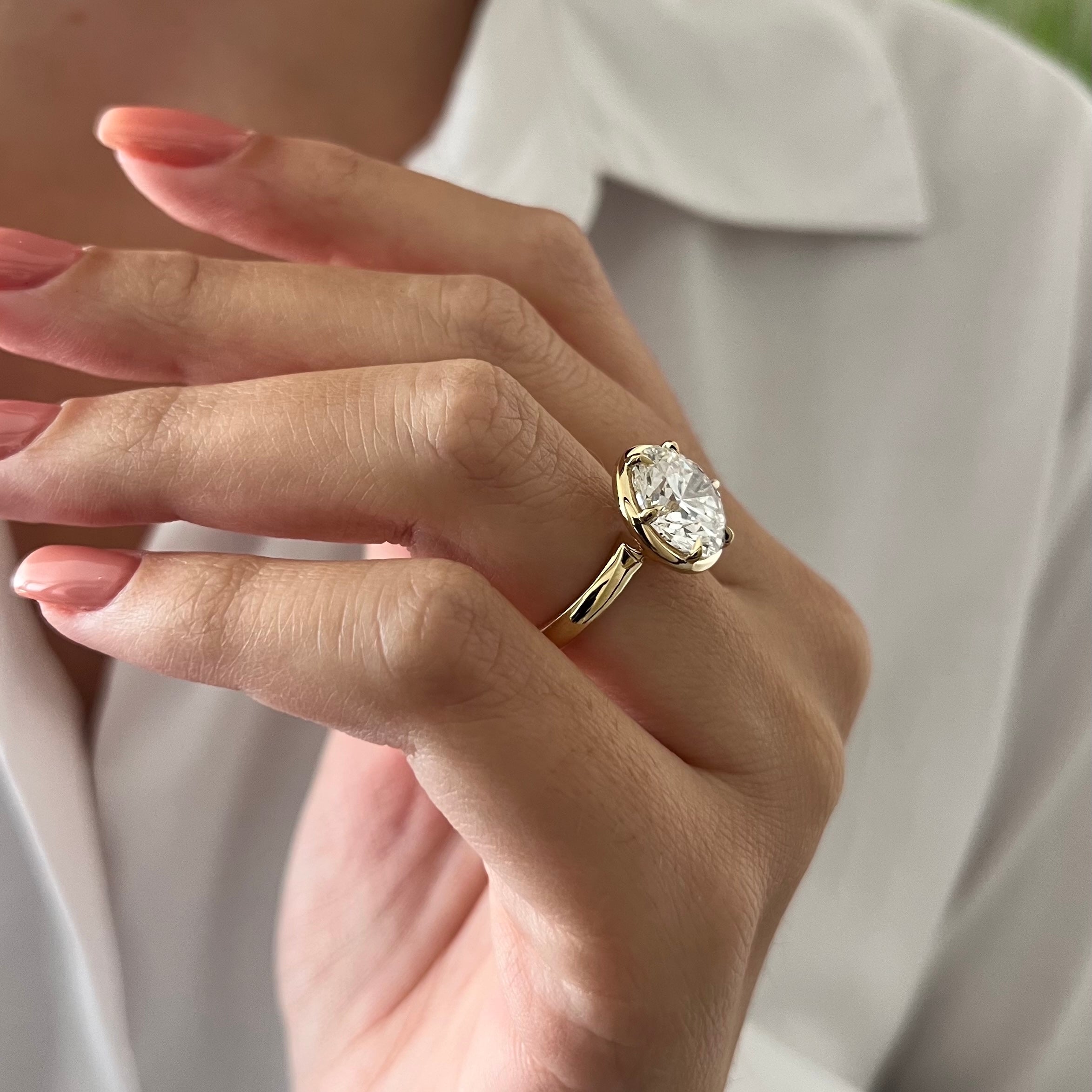5 carat Oval cut lab-grown diamond IGI certified, bezel engagement ring.