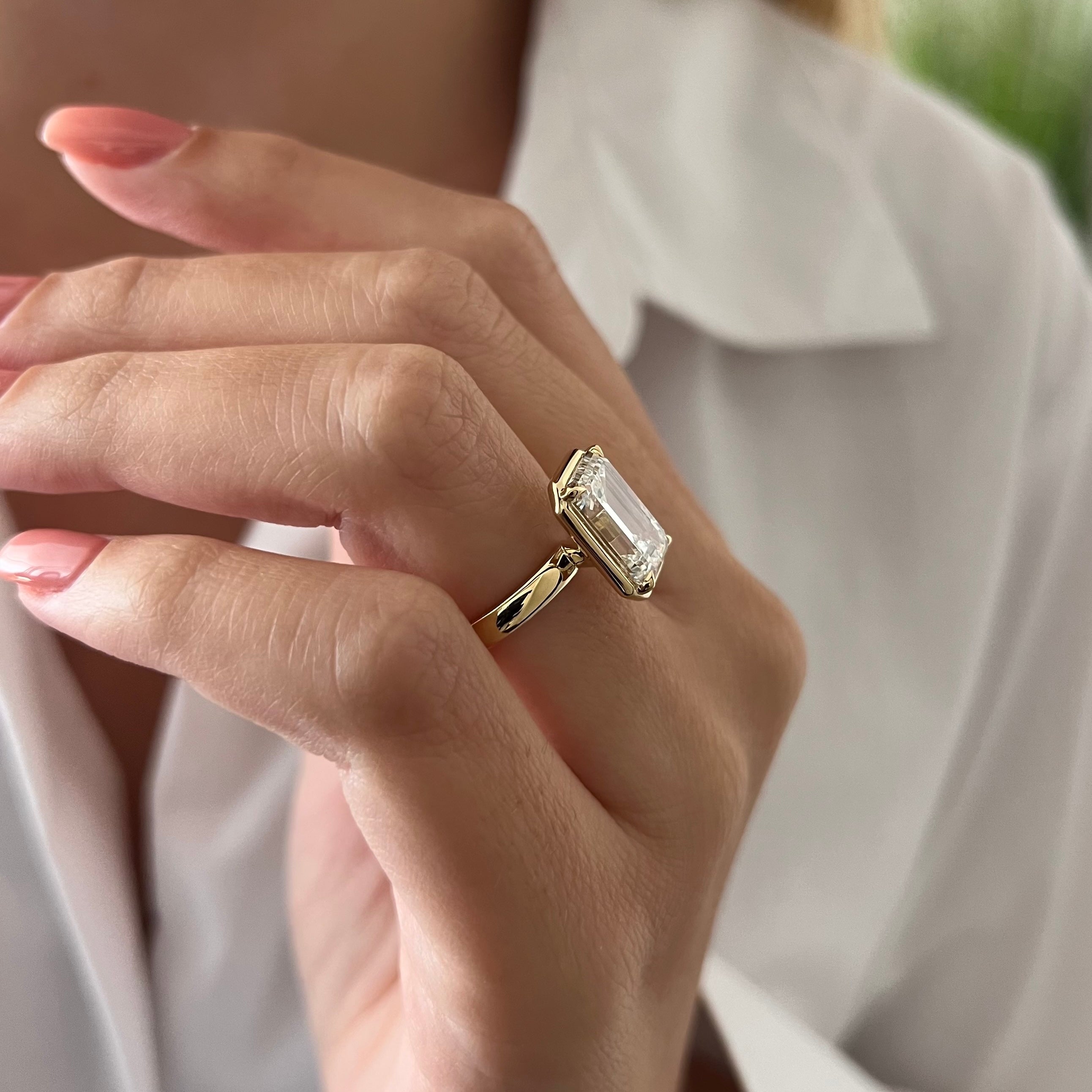 5 carat Oval cut lab-grown diamond IGI certified, bezel engagement ring.