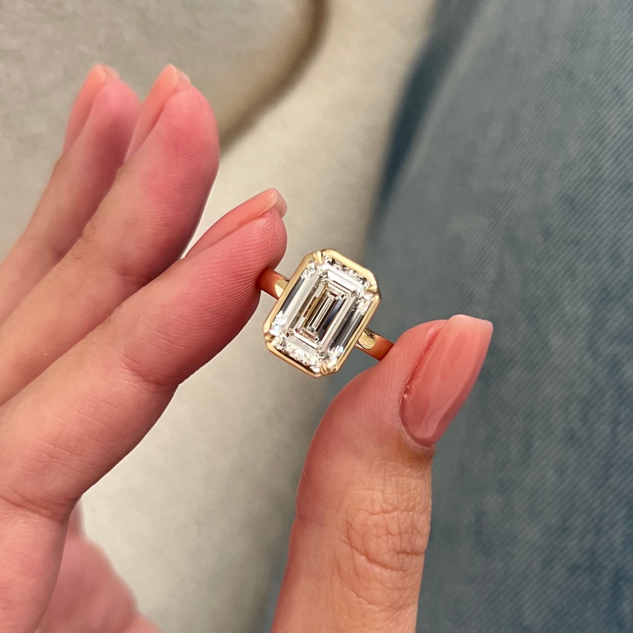 5 carat Oval cut lab-grown diamond IGI certified, bezel engagement ring.