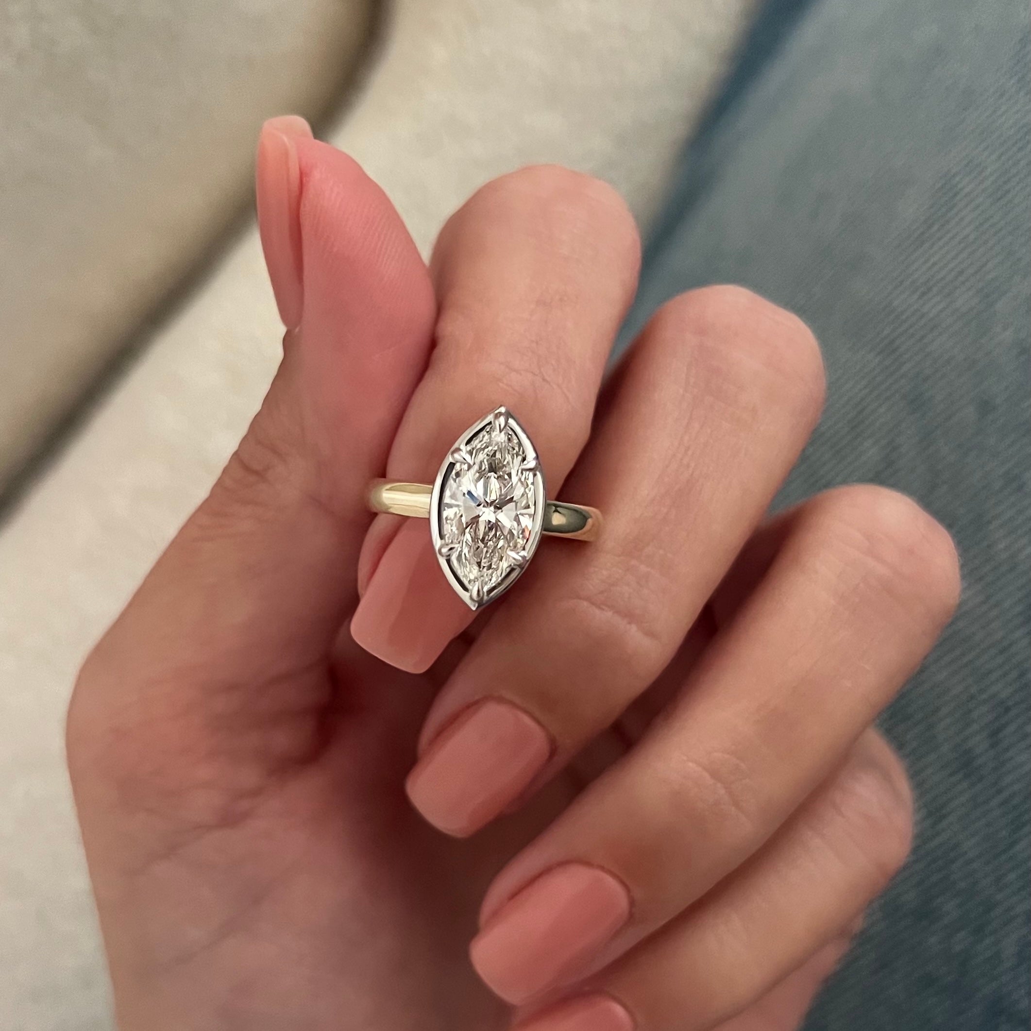 2 carat Oval cut lab-grown diamond IGI certified, bezel engagement ring.