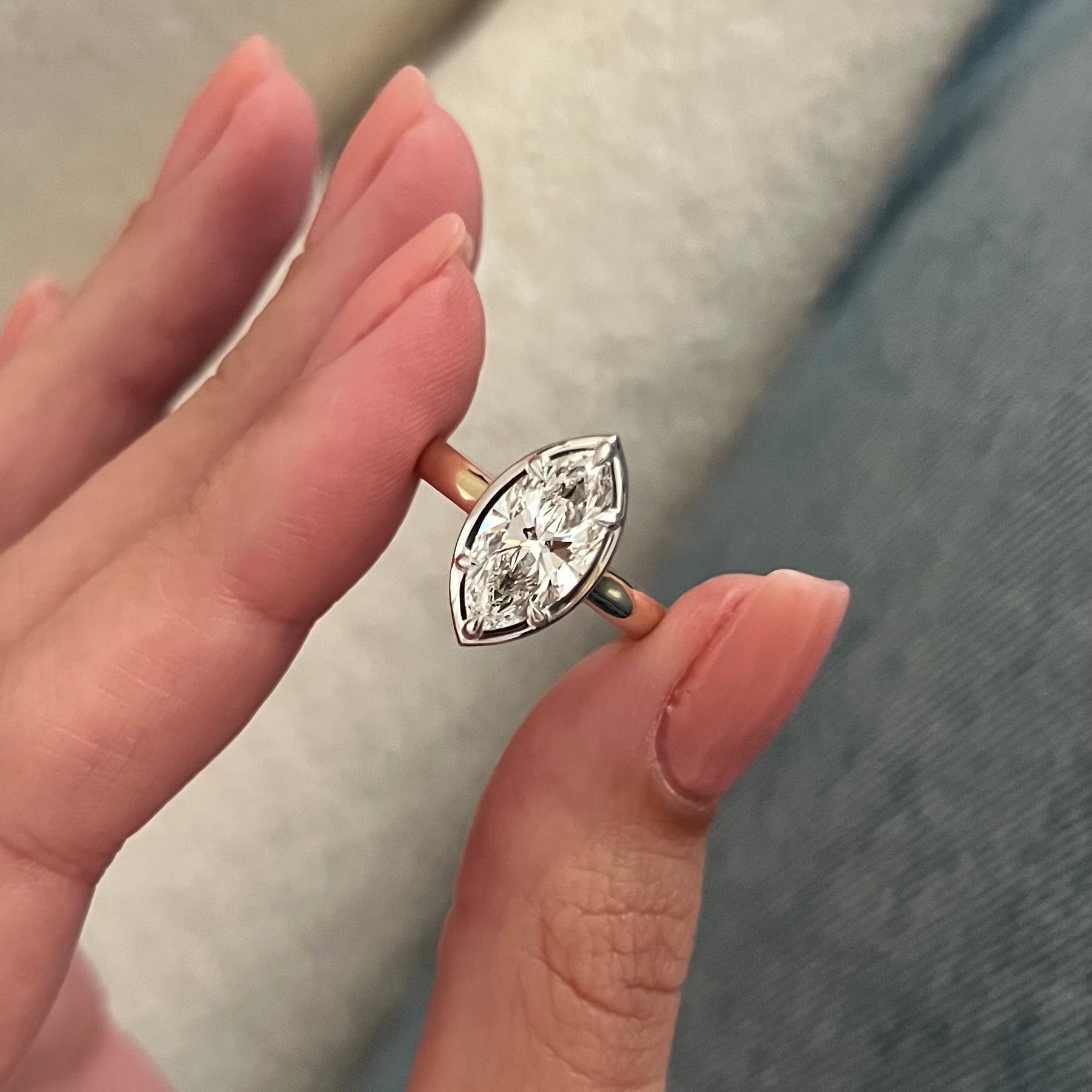 2 carat Oval cut lab-grown diamond IGI certified, bezel engagement ring.