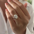 2 carat Oval cut lab-grown diamond IGI certified, bezel engagement ring.