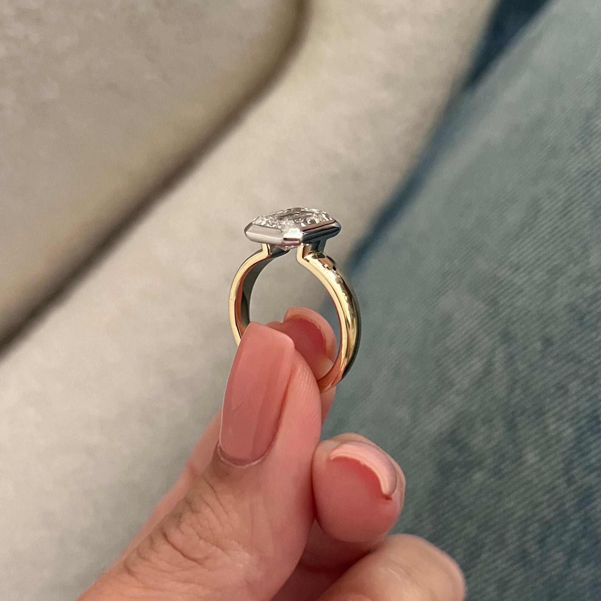 3 carat Oval cut lab-grown diamond IGI certified, bezel engagement ring.