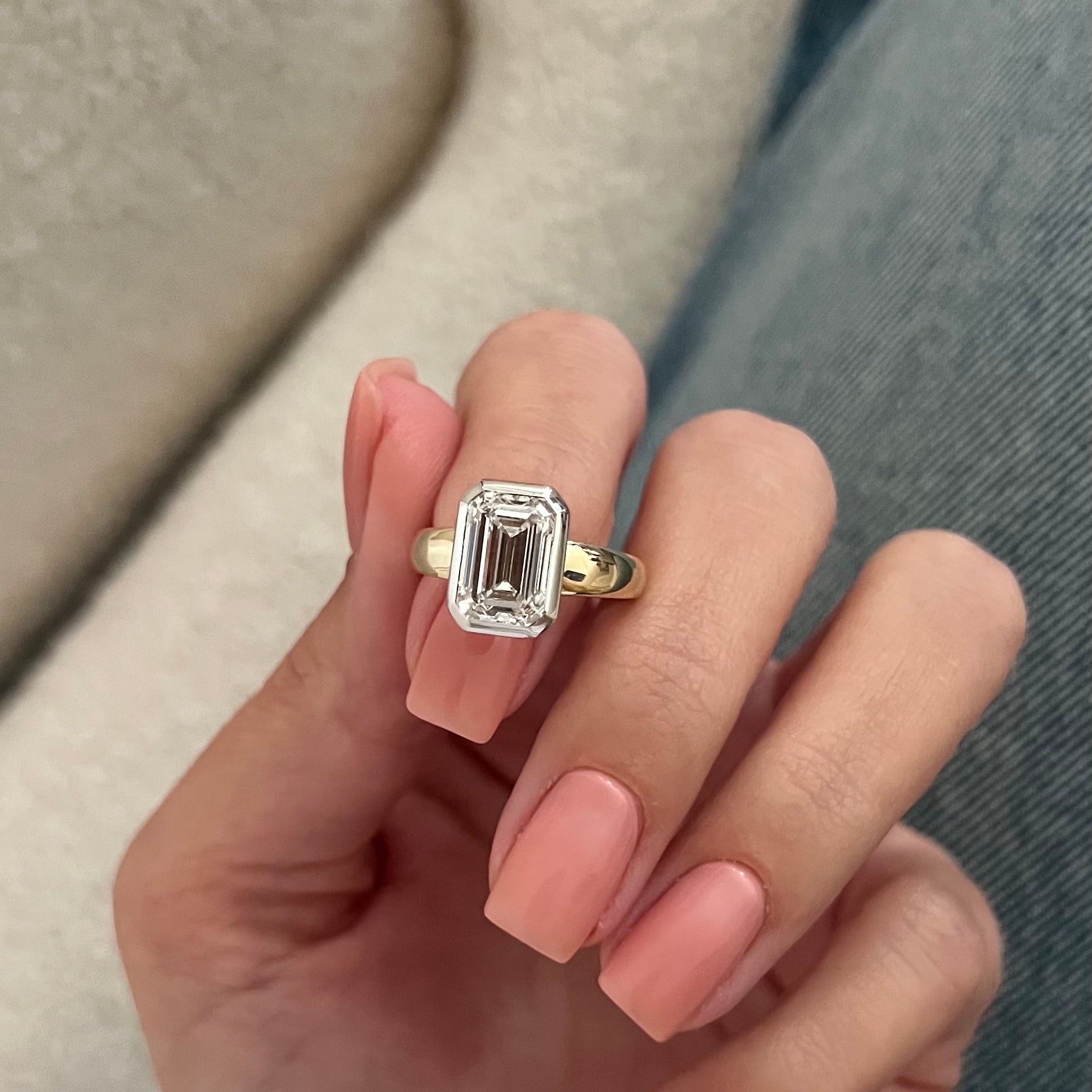 3 carat Oval cut lab-grown diamond IGI certified, bezel engagement ring.