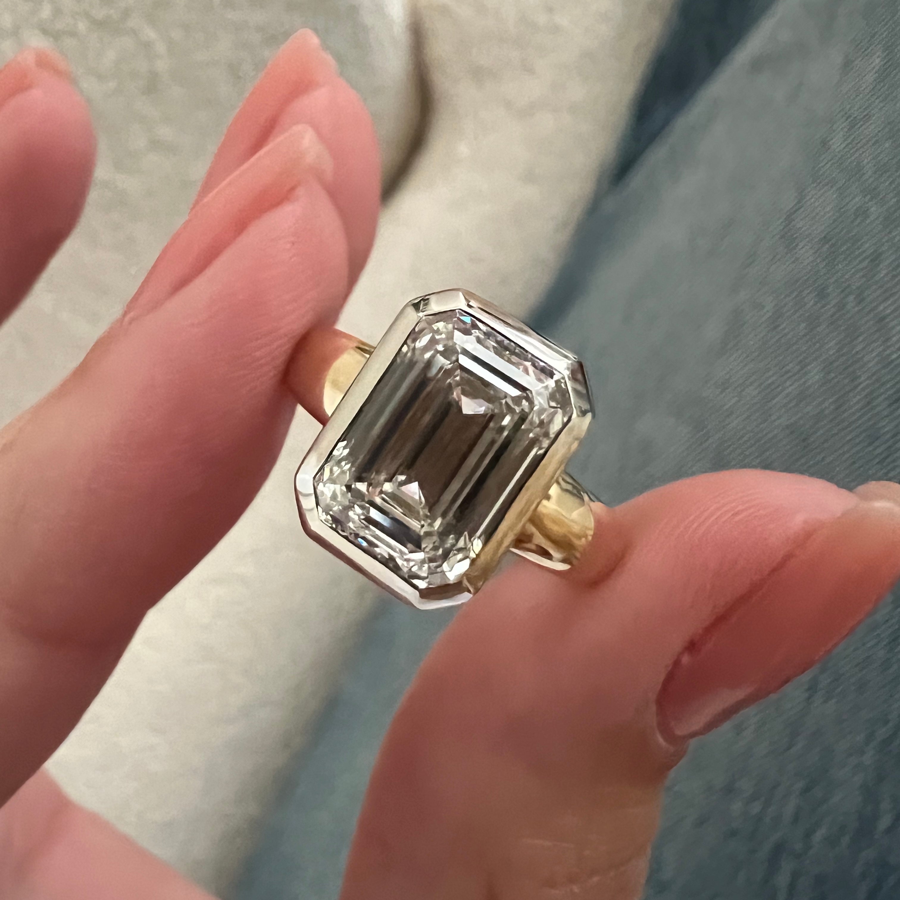 3 carat Oval cut lab-grown diamond IGI certified, bezel engagement ring.
