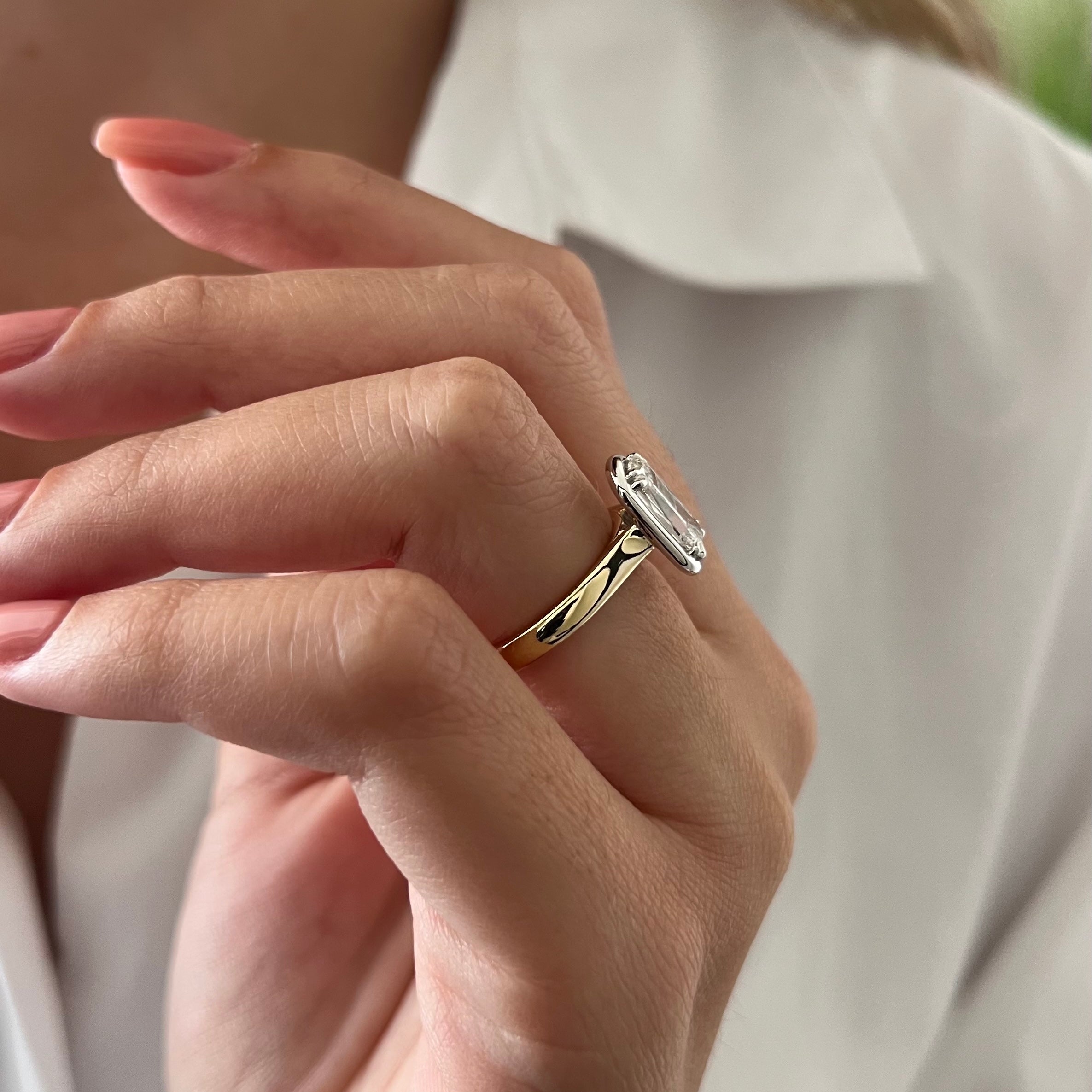 2 carat Oval cut lab-grown diamond IGI certified, bezel engagement ring.