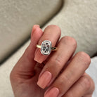 2 carat Oval cut lab-grown diamond IGI certified, bezel engagement ring.