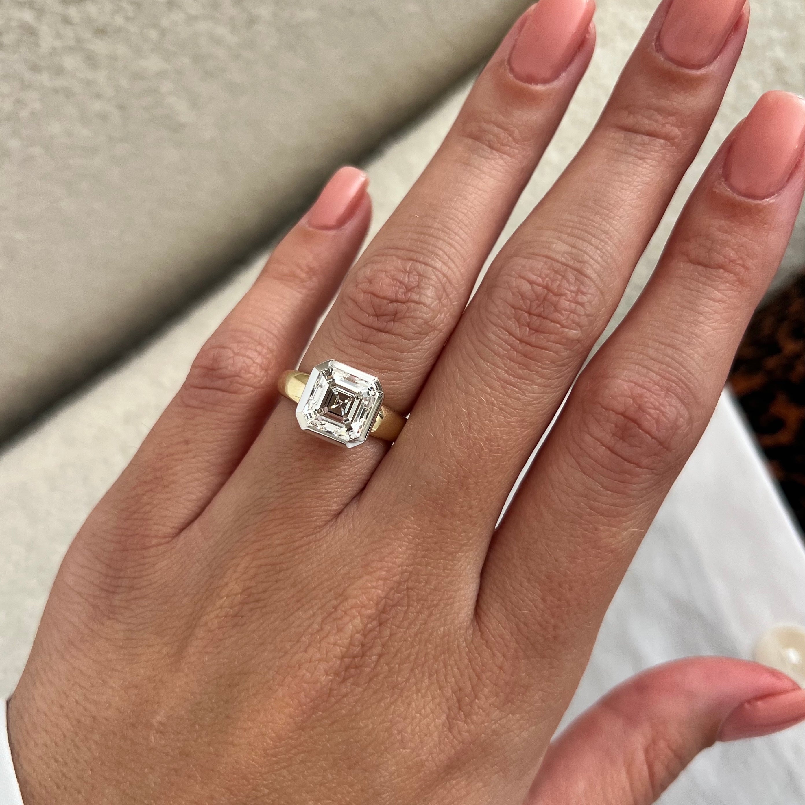 3 carat Oval cut lab-grown diamond IGI certified, bezel engagement ring.