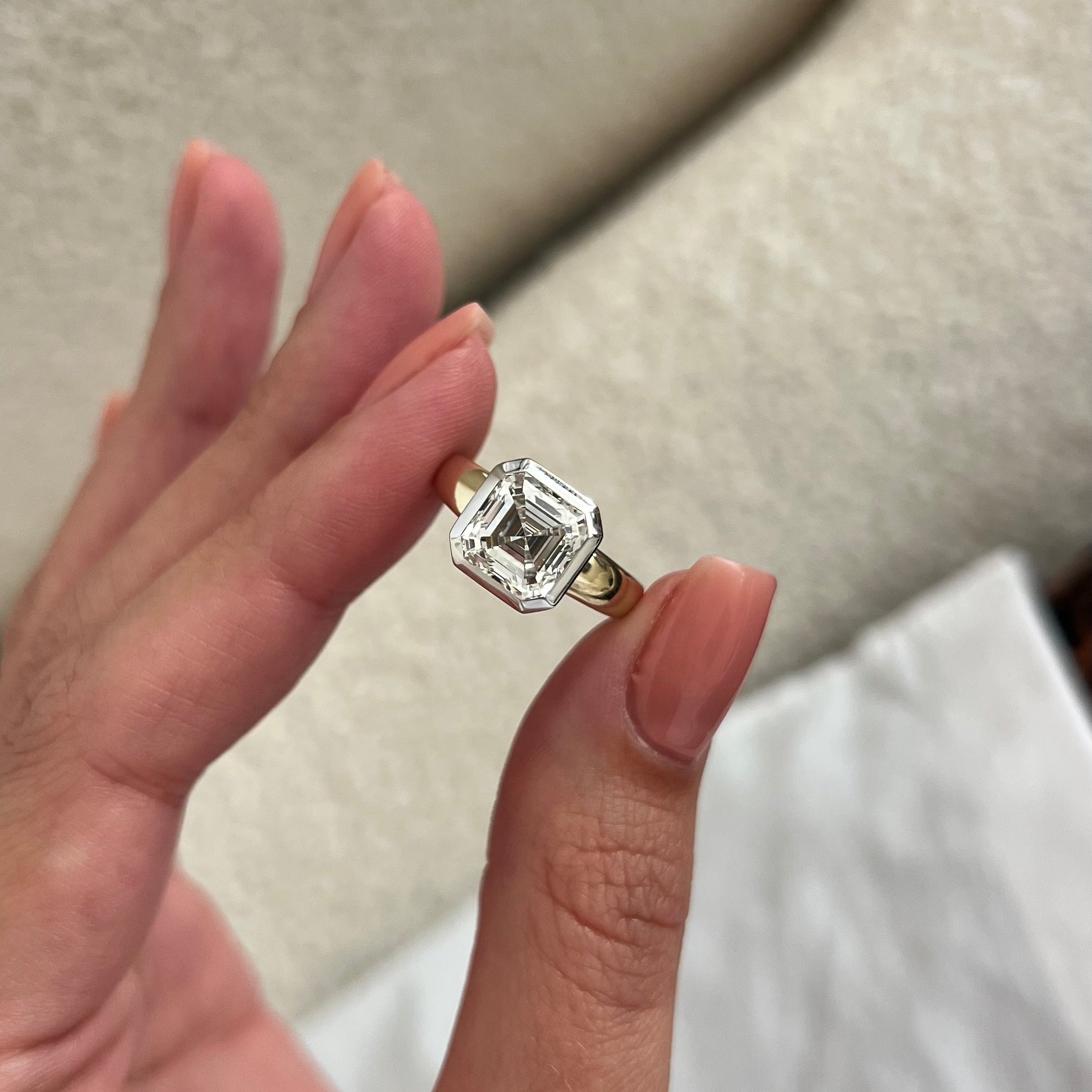 3 carat Oval cut lab-grown diamond IGI certified, bezel engagement ring.