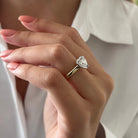 2 carat Oval cut lab-grown diamond IGI certified, bezel engagement ring.