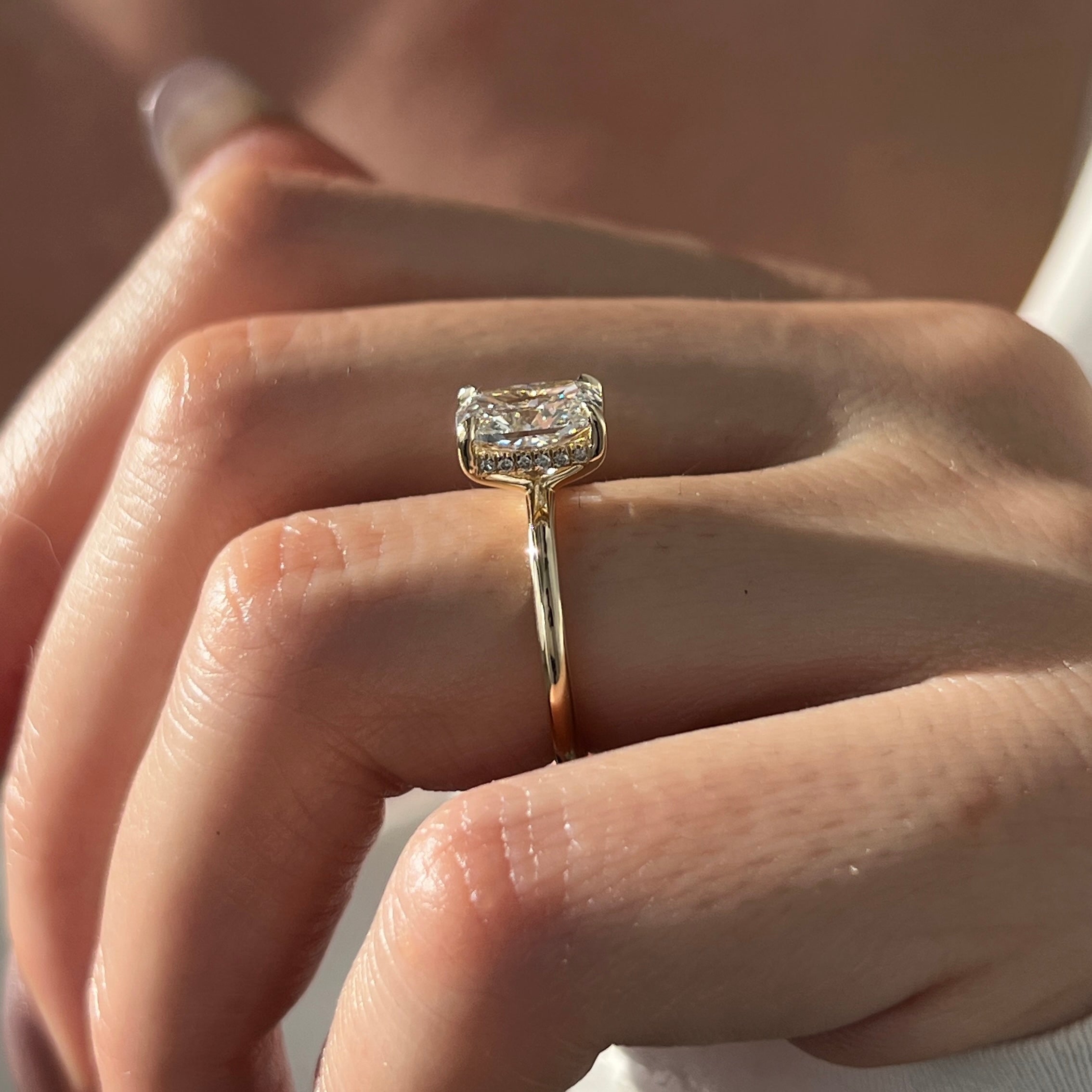 3 carat Oval cut lab-grown diamond IGI certified, hidden halo engagement ring.
