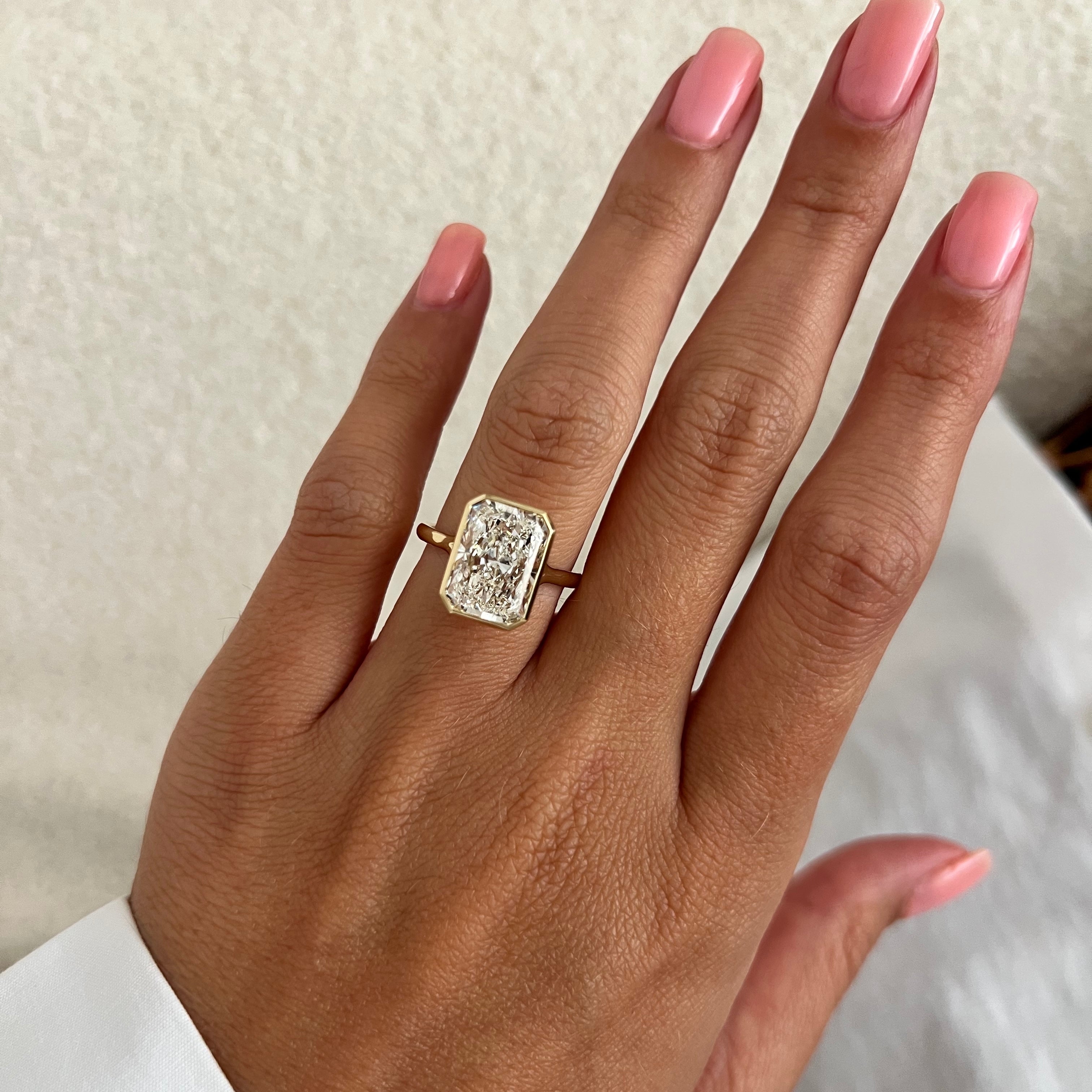5 carat Radiant cut lab-grown diamond IGI certified, solitaire engagement ring.