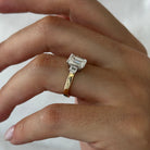 all-groups | 2.25 carat Emerald cut lab-grown diamond IGI certified, three stone engagement ring.