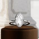 2 carat Elongated Cushion cut lab-grown diamond IGI certified, bezel engagement ring.