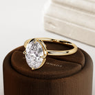 2 carat Elongated Cushion cut lab-grown diamond IGI certified, bezel engagement ring.
