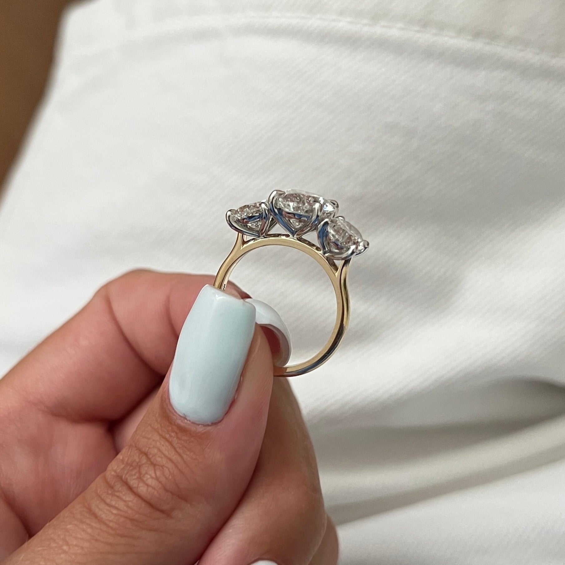 2.5 carat Oval cut lab-grown diamond IGI certified, three stone engagement ring.