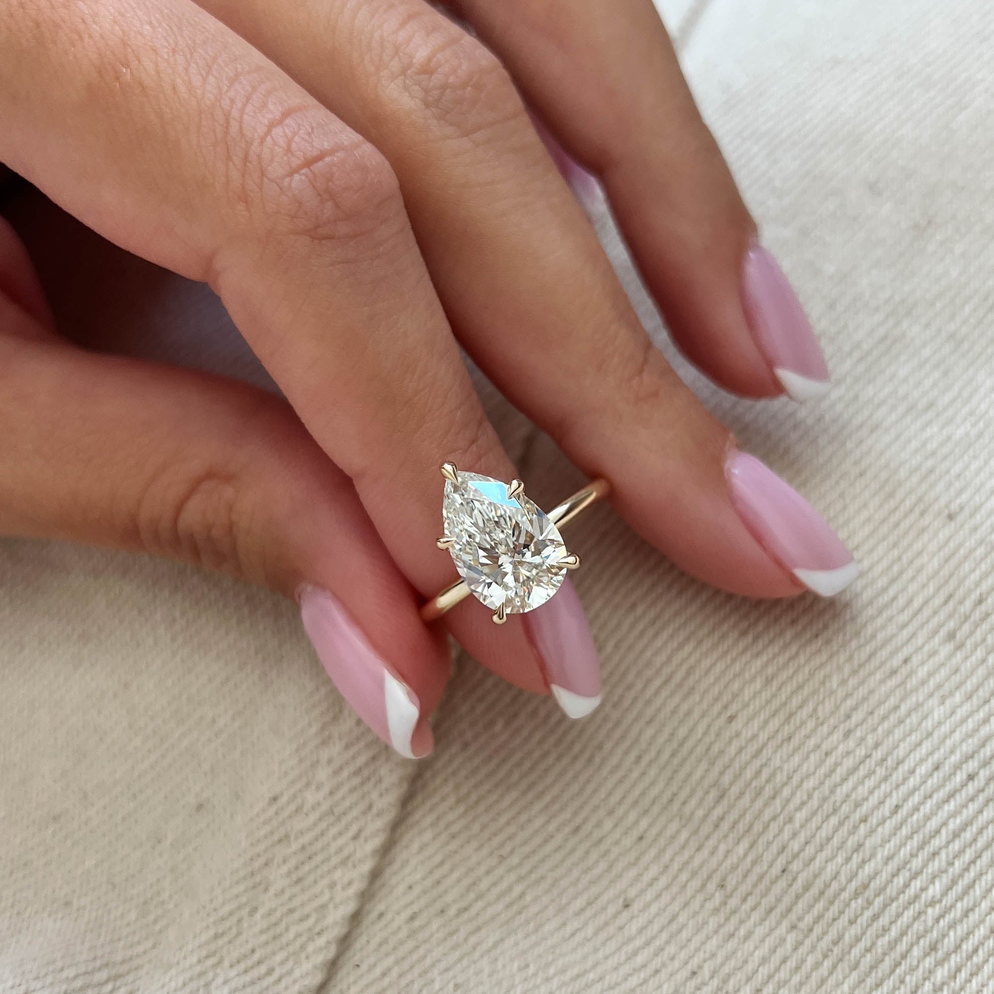 3 carat Pear cut lab-grown diamond IGI certified, solitaire engagement ring.