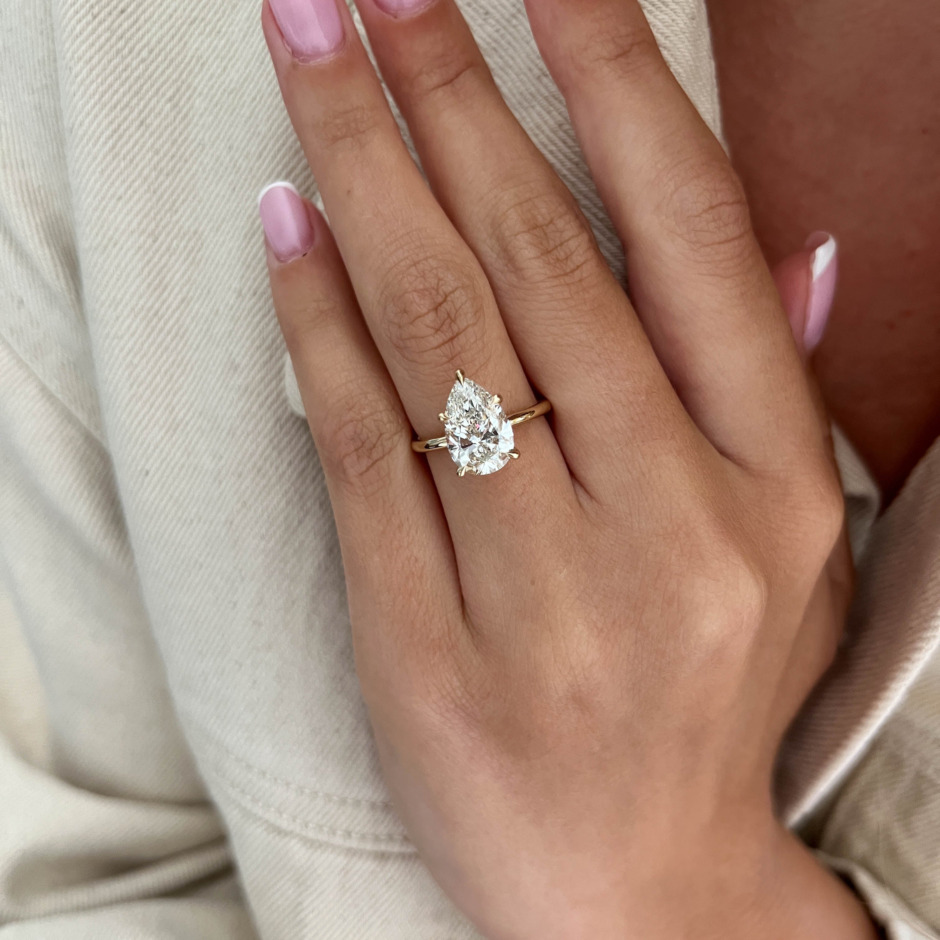 3 carat Pear cut lab-grown diamond IGI certified, solitaire engagement ring.