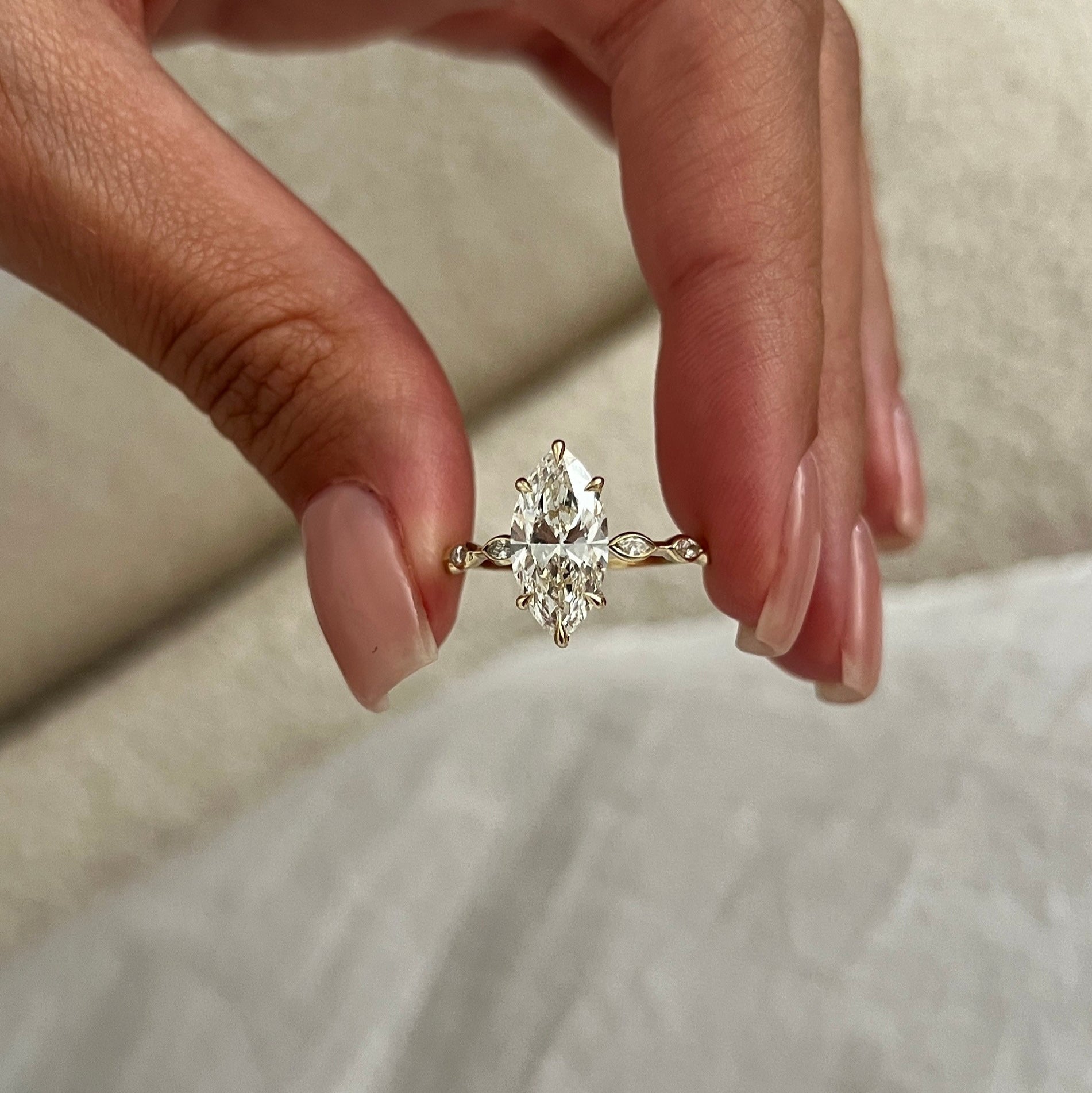 1 carat Marquise cut lab-grown diamond IGI certified, side stones engagement ring.