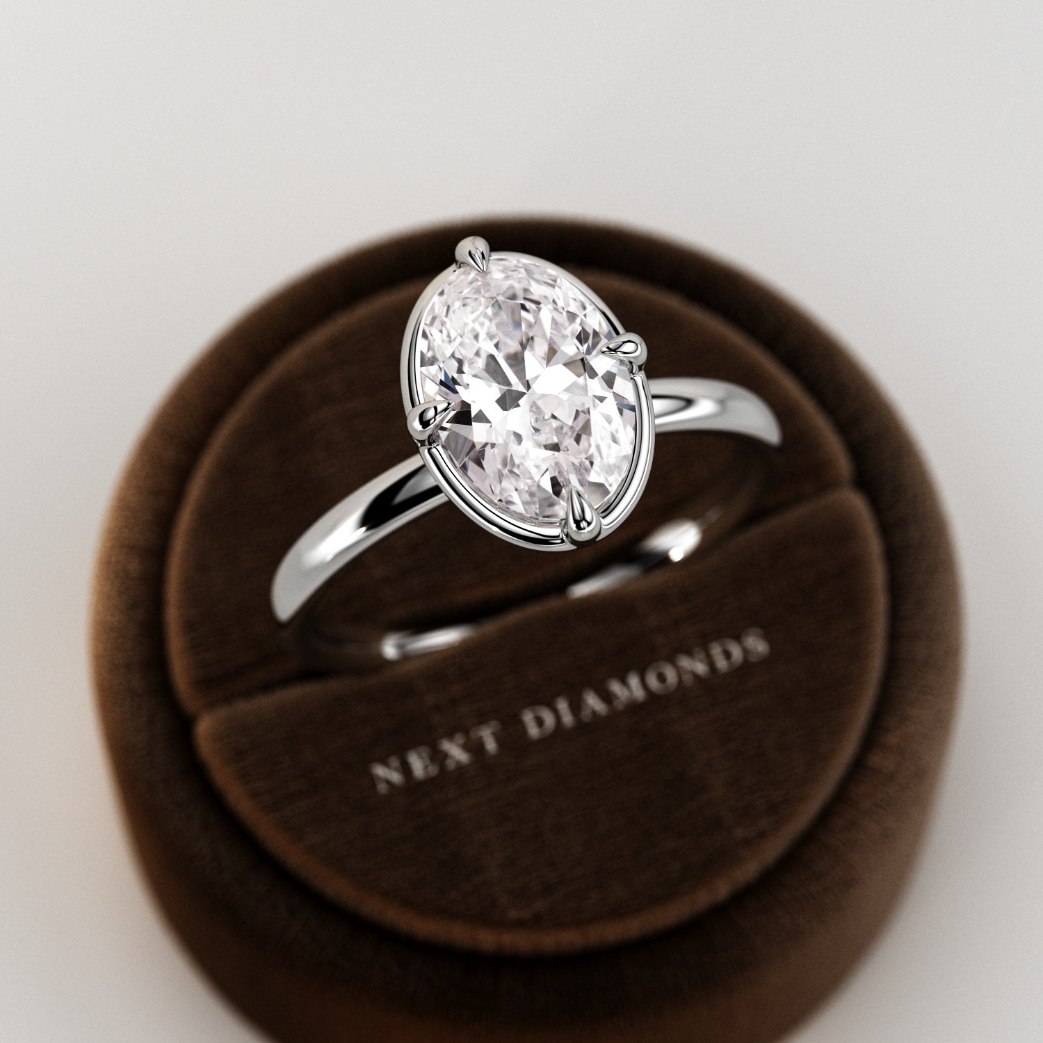 2 carat Elongated Cushion cut lab-grown diamond IGI certified, bezel engagement ring.