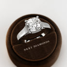 2 carat Cushion cut lab-grown diamond IGI certified, bezel engagement ring.
