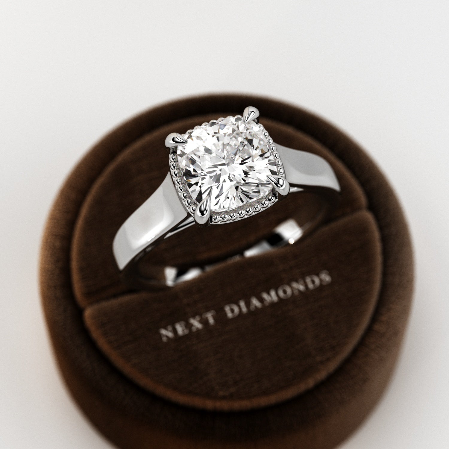 2 carat Cushion cut lab-grown diamond IGI certified, bezel engagement ring.