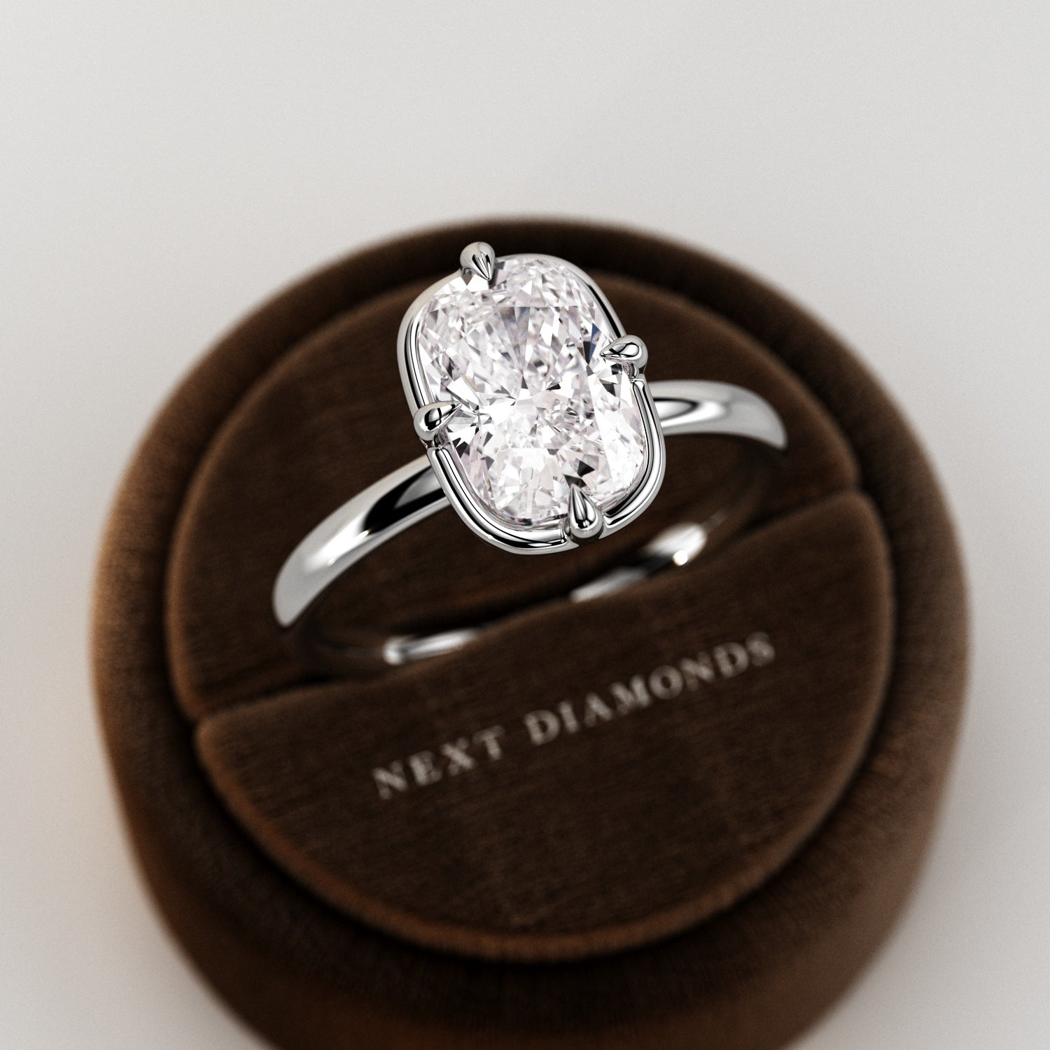 2 carat Elongated Cushion cut lab-grown diamond IGI certified, bezel engagement ring.