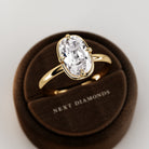 2 carat Elongated Cushion cut lab-grown diamond IGI certified, bezel engagement ring.