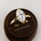 2 carat Elongated Cushion cut lab-grown diamond IGI certified, bezel engagement ring in 14K Yellow Gold.