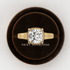 2 carat Cushion cut lab-grown diamond IGI certified, bezel engagement ring.