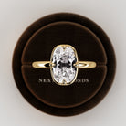 2 carat Elongated Cushion cut lab-grown diamond IGI certified, bezel engagement ring.